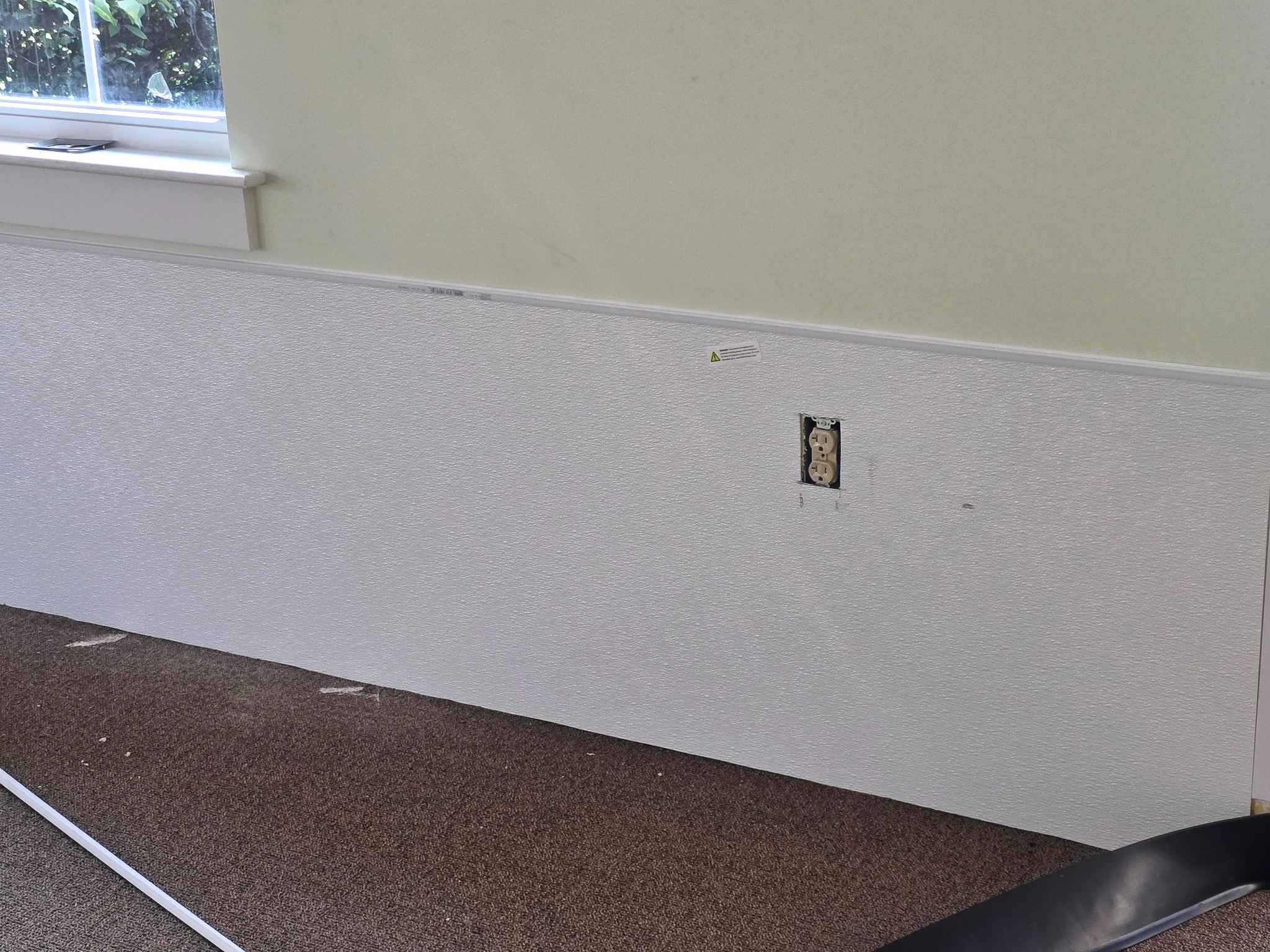 Restored wall after water damage repair