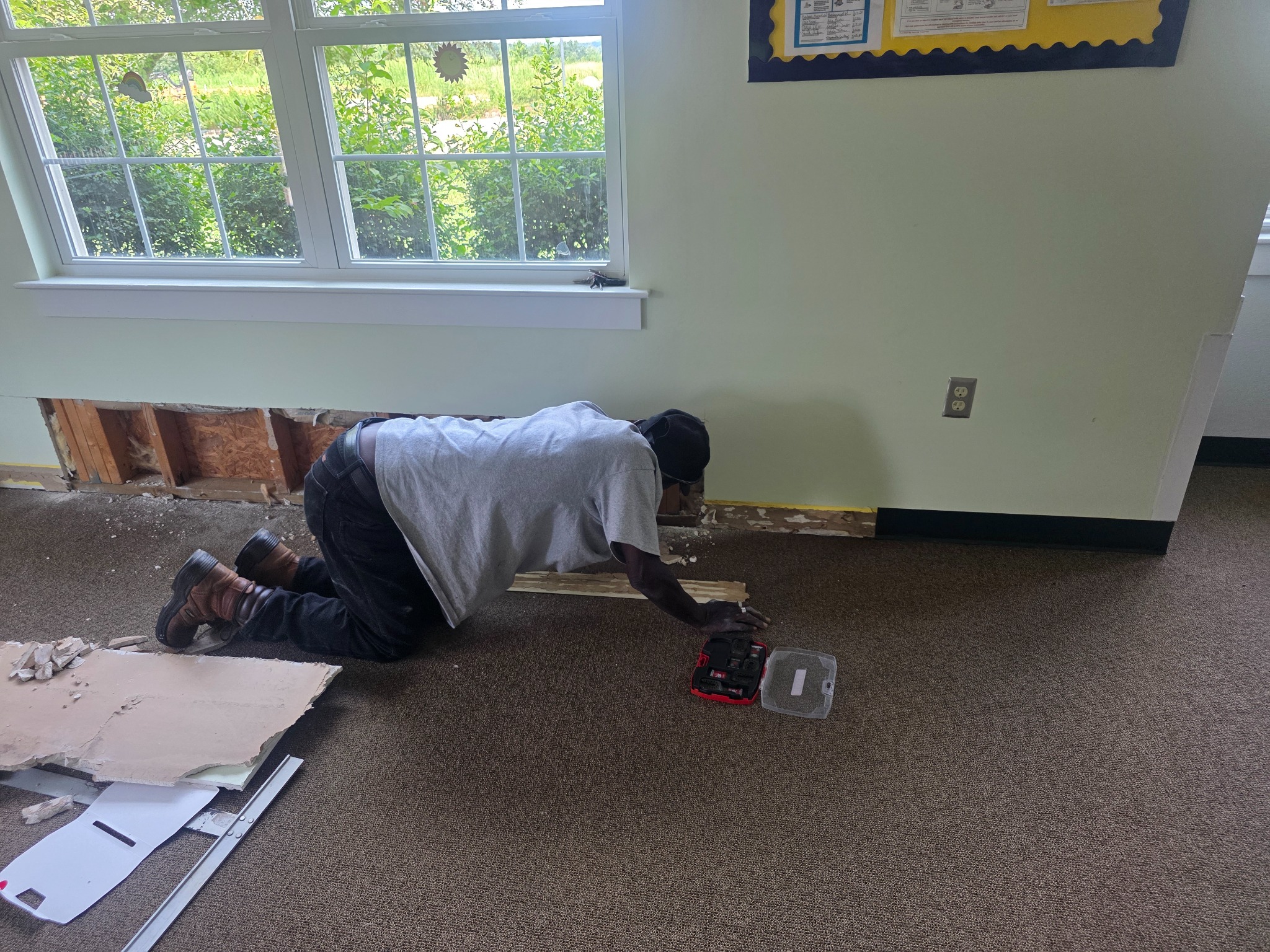 Wall opened for water damage repair before restoration